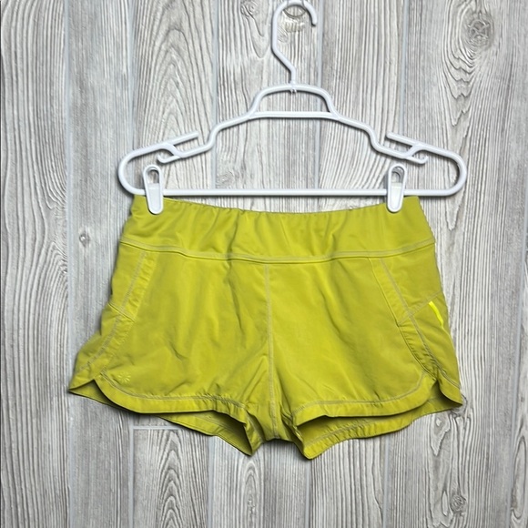 Athleta Yellow Athletic shorts size small - Picture 1 of 5